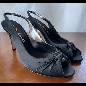 Peep Toe Sling back heels by Nina